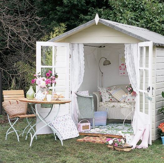 A white shed, representing how white can make your she shed look girly and cute